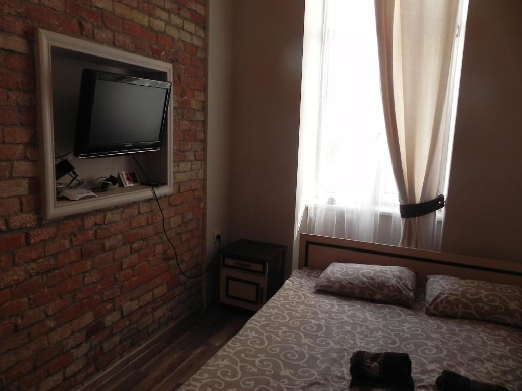 Апартаменты The Heart of Lviv Apartments - Lviv Львов