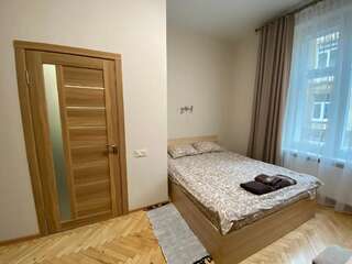Апартаменты The Heart of Lviv Apartments - Lviv Львов Апартаменты – Ул. Петра Дорошенко, 19/2-2